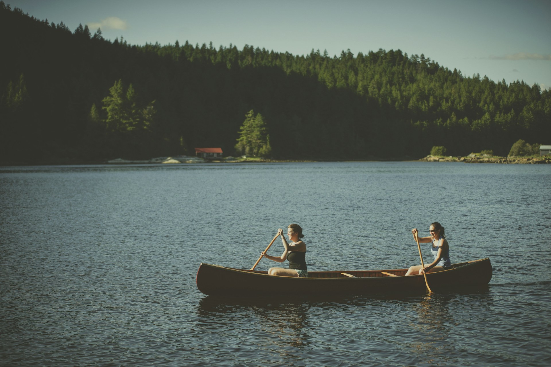 Paddlers on calm Sunshine Coast water in British Columbia